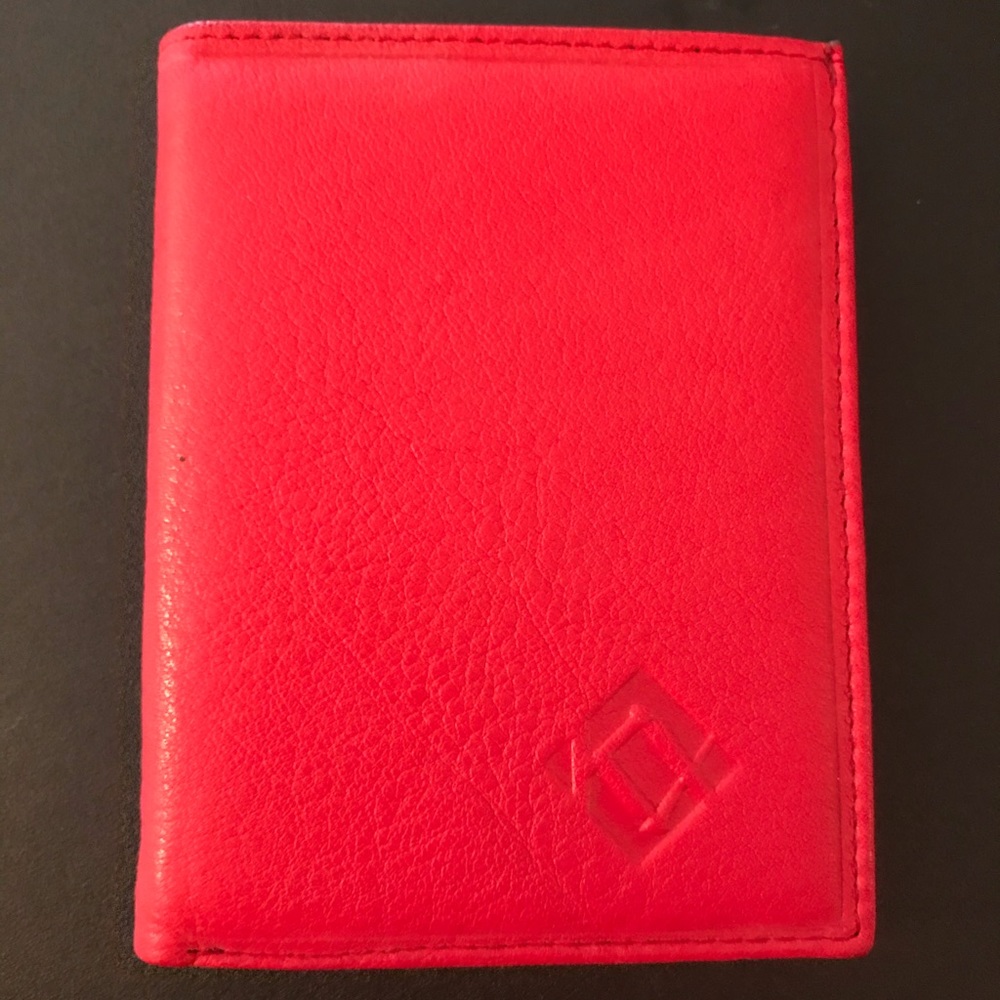 Red leather-like wallet.  Never used.